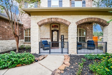 Step into elegance through a wrought iron gate lea