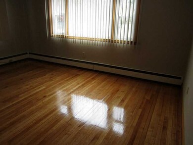 Living Room. gleaming hardwoods in living room and