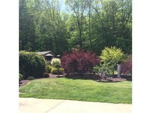 Gorgeous landscaping provides privacy and tranquil