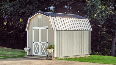 View of outdoor structure featuring a storage unit