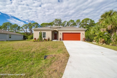 874 Cornelia Ave SE, Palm Bay, FL 32909 - photo 2