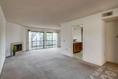 Very spacious living room with fireplace and views