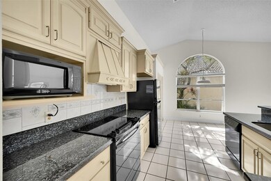 9581 Tavernier Dr, Boca Raton, FL 33496 - photo 5