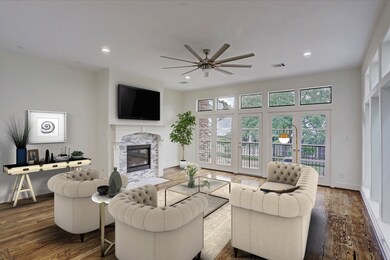 The gas log fireplace serves as the focal point in