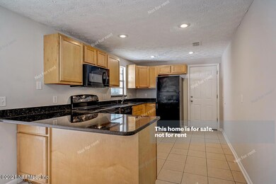6937 Oriely Dr S, Jacksonville, FL 32210 - photo 2