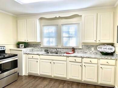 New cabinetry, counters and backsplash