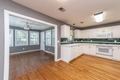 kitchen is open to sunroom