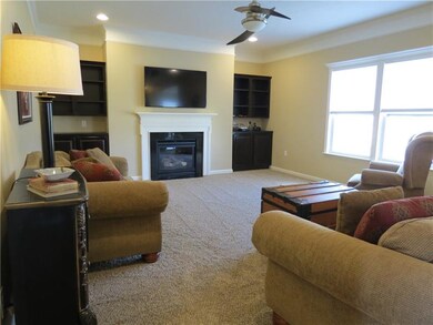 In addition to the large windows, the family room 