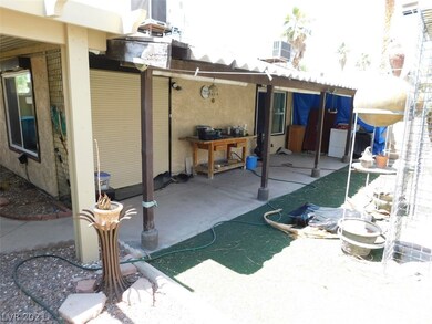 Spacious Backyard with mature landscaping and shad