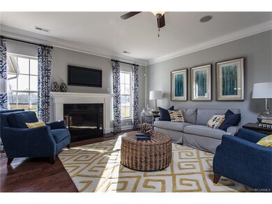 Photo of another Cypress family room. Crown moldin