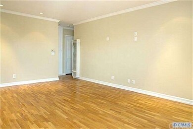 living room with crown molding, recessed lighting,