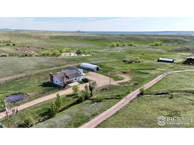 Zoned Agriculture that allows horses and livestock and home businesses.