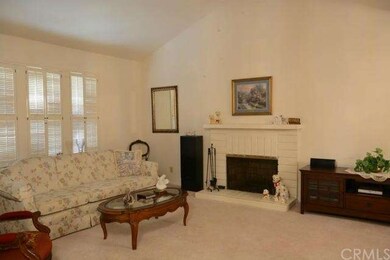Formal Living room, with fireplace, shutters and C