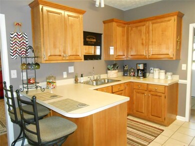 Kitchen with breakfast bar.