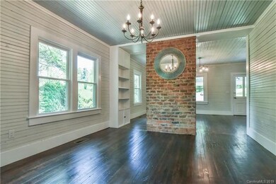 Spacious, bright dining room with original bead bo