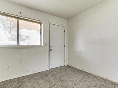 Empty room featuring a wealth of natural light and