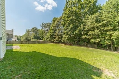 View of fenced backyard