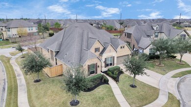 Corner cul-de-sac lot allows for wrap-around stree