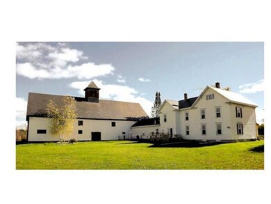 Exterior Back. Property from Field ...