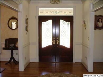 Entry Foyer, Hardwood floors, chair railing and de