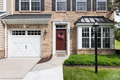 Property entrance featuring a garage