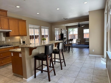 Large kitchen with bar top and open to dining area.  You can be in the kitchen and be with the family in the family room.