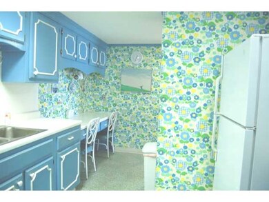 Another view of the kitchen with eating area.  Mor
