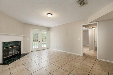 Formal Living Room toward the Pool and Kitchen