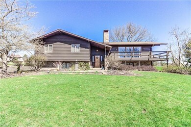 BEAUTIFUL CEDAR AND BRICK HOME ON 2 ACRES IN CARRO