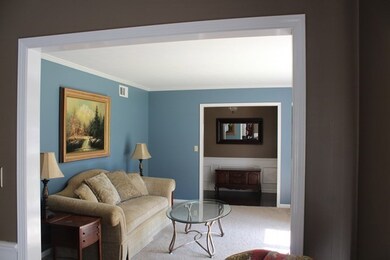 Living room open to formal dining room
