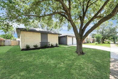 The exterior showcases a stylish facade and curb a