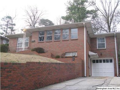 Street view of this beautiful brick home!