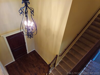 Another angle of your two story foyer. Wrought Iro
