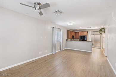 Unfurnished living room with light wood-style floo