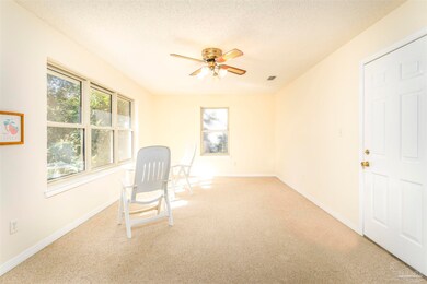 Between garage/LR - 4 large windows