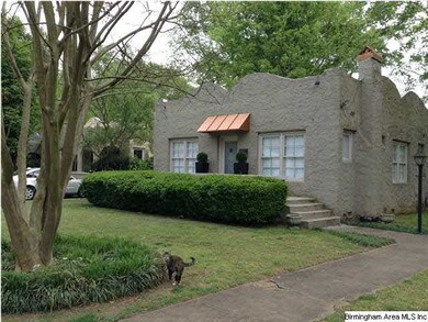 Large, level landscaped yard with privacy fence.