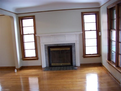 Beautifully refinished hardwood floor and natural 