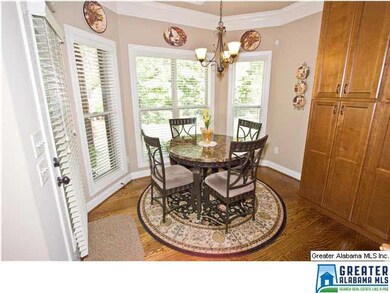 Eat-in kitchen looks out to private back yard.