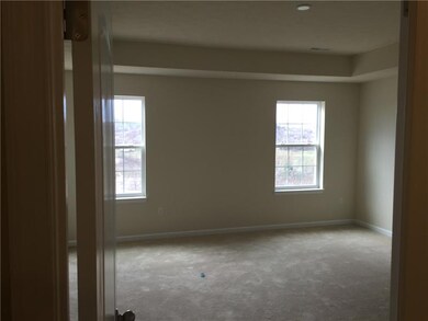 Master bedroom has tray ceiling and spectacular vi