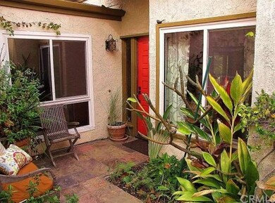 Lighted court yard with tropical landscaping. 