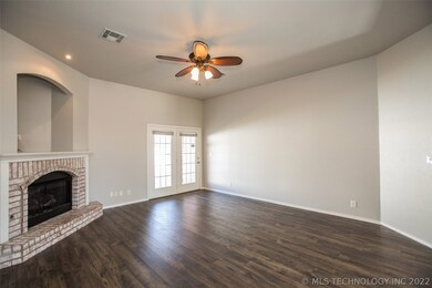 French doors lead to covered patio.