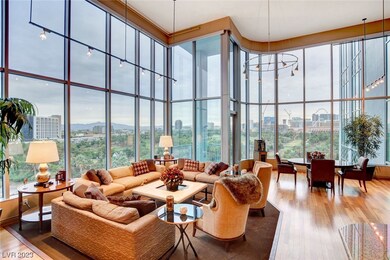 Open concept with floor to ceiling windows.