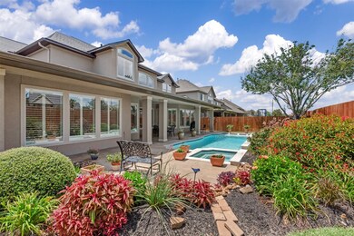 Lush backyard landscaping with large covered patio and green space! Also… no back door neighbor!