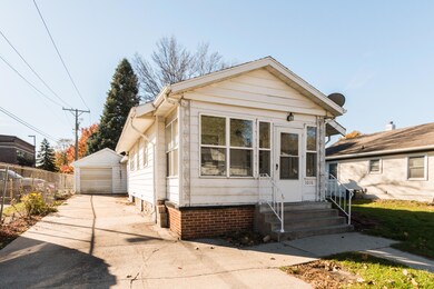 Front View with Attached Heated Garage