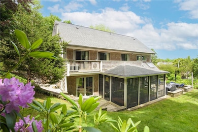 Private grounds and large grassy yard