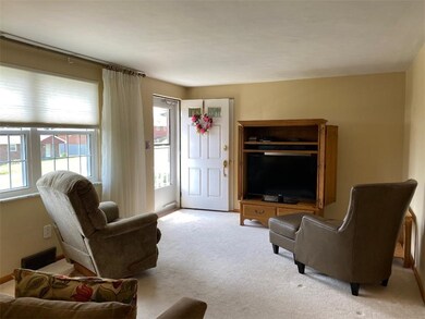 Enter into the Living Room with light streaming in