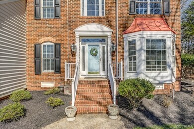 Your brick and vinyl exterior offers a stately fac