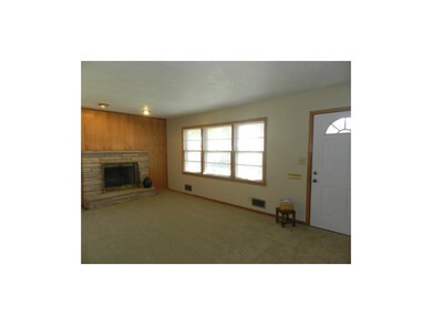 Gorgeous living room with stone fireplace! New fro