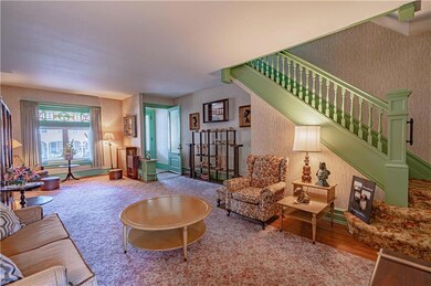 Beautiful large living room with hardwood flooring