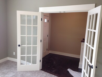 view of office and foyer